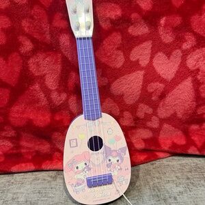 Hello kitty kids ukulele and pick